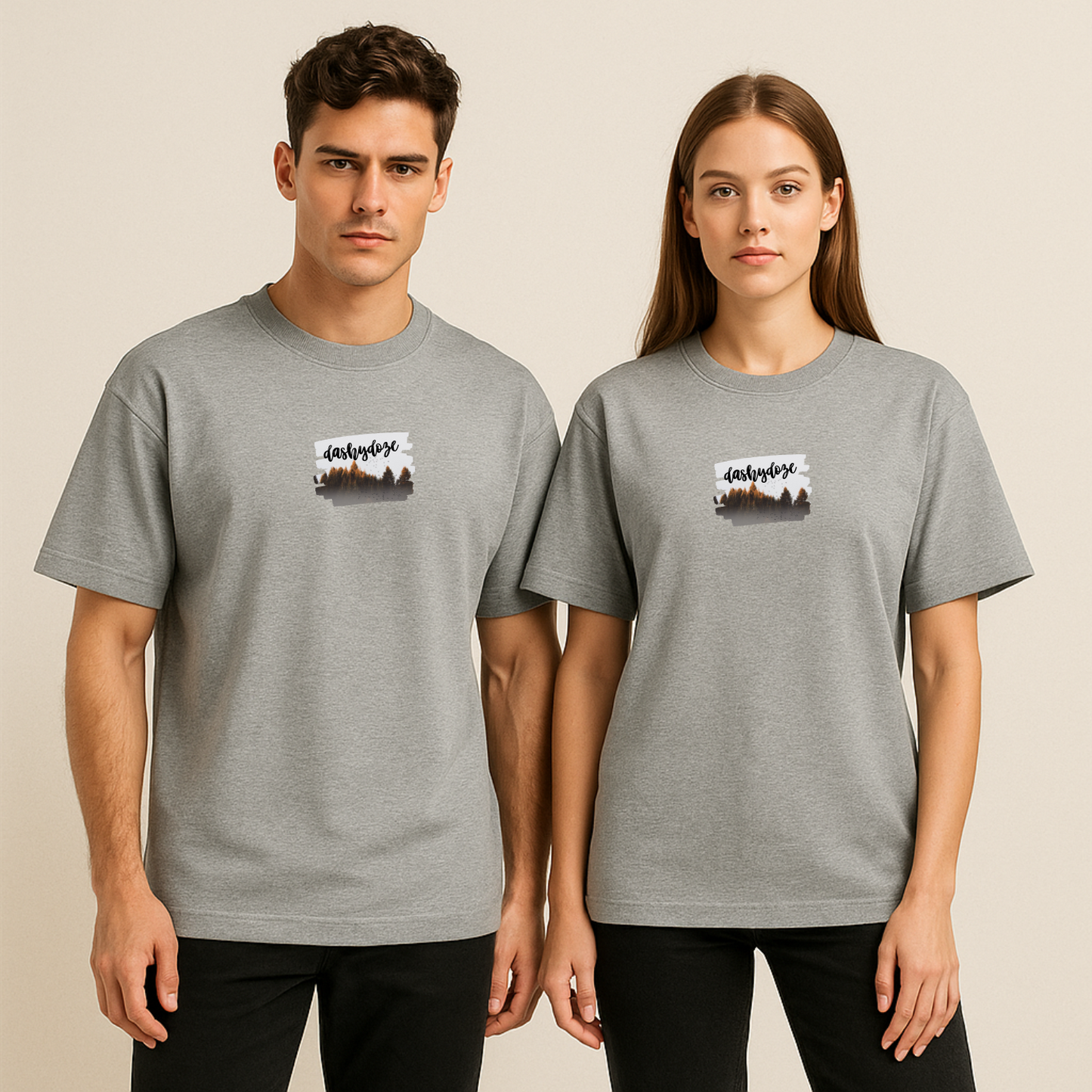 Two people wearing gray t-shirts with a logo on a beige background