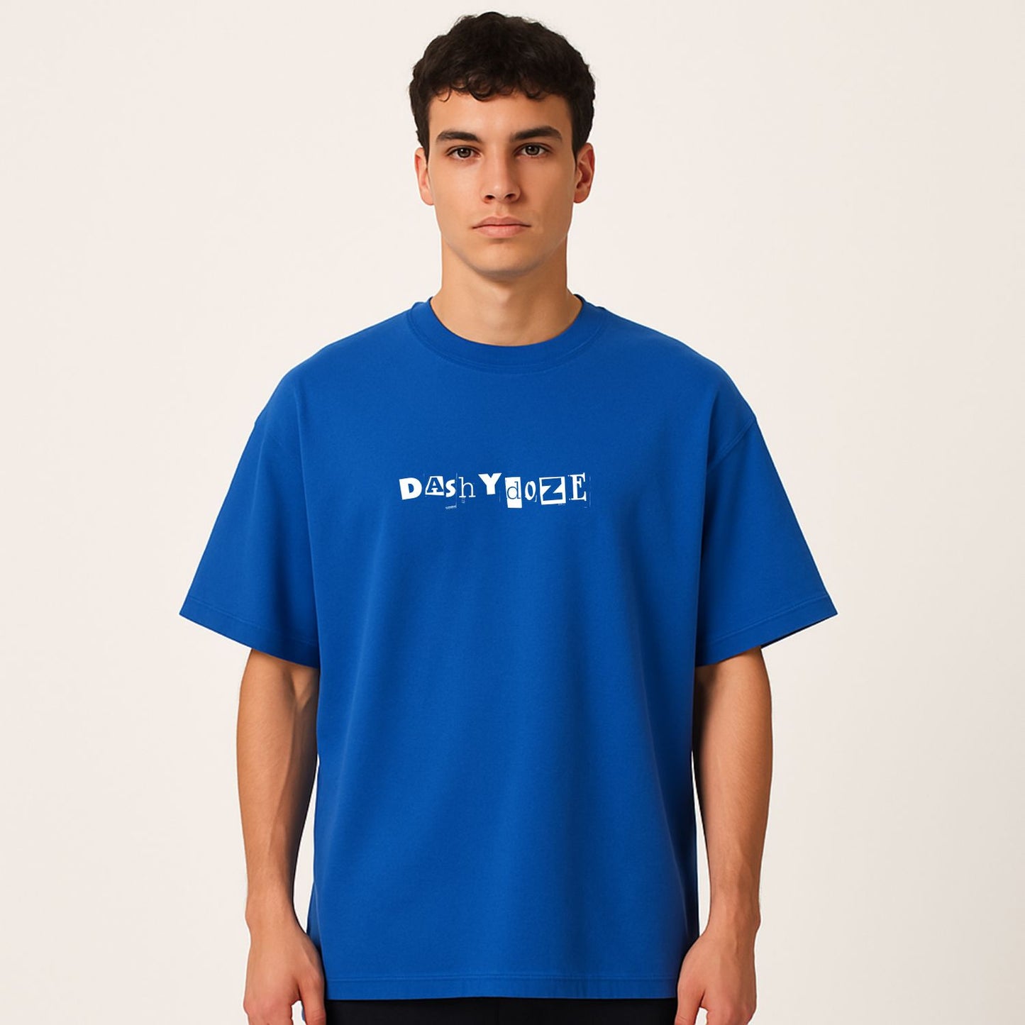 Person wearing a blue t-shirt with 'Dash Yolo' text on a plain background